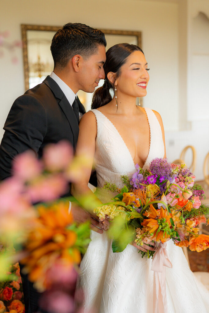 Bride and groom smiling together at Hollins House in Santa Cruz, California.