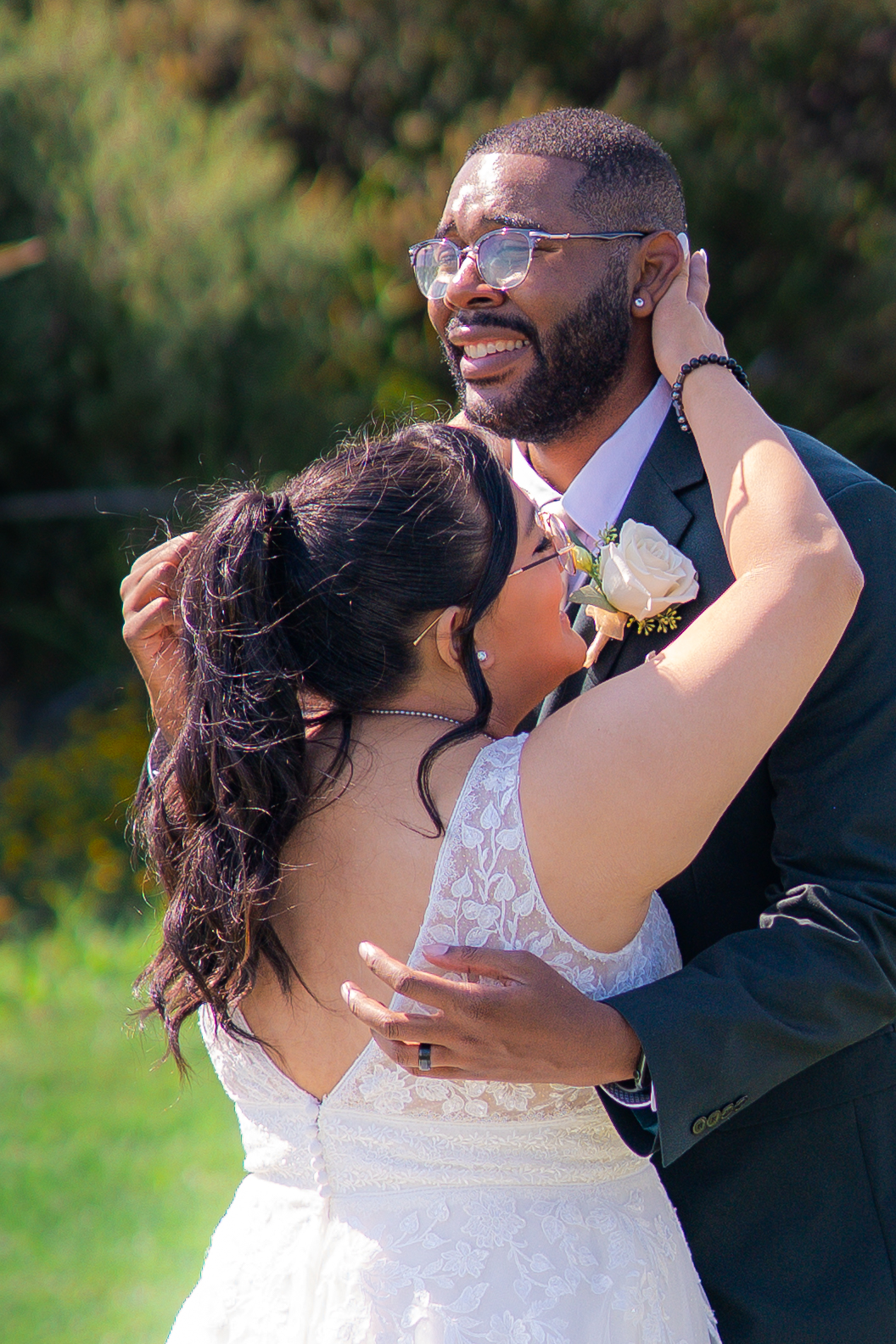 Bride and groom sharing an emotional first look at Fairview Metropolitan in Oakland, California.