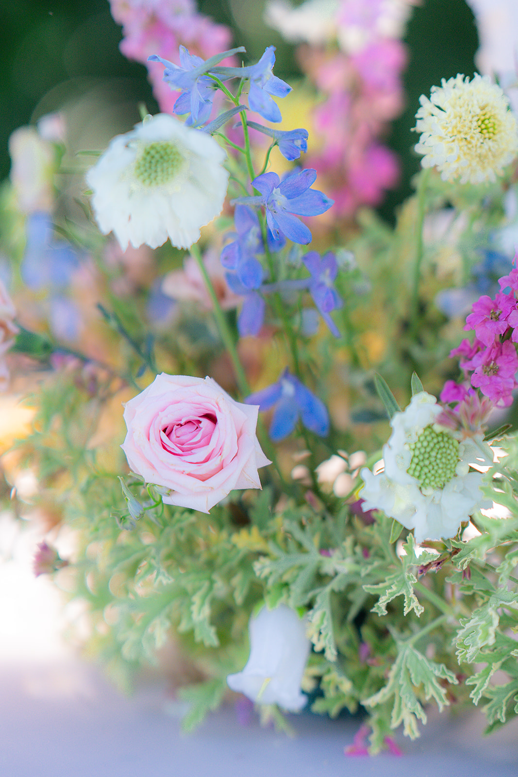 Flowers arranged as part of the garden wedding décor at Rainbow Oaks Ranch in Sanger, California.