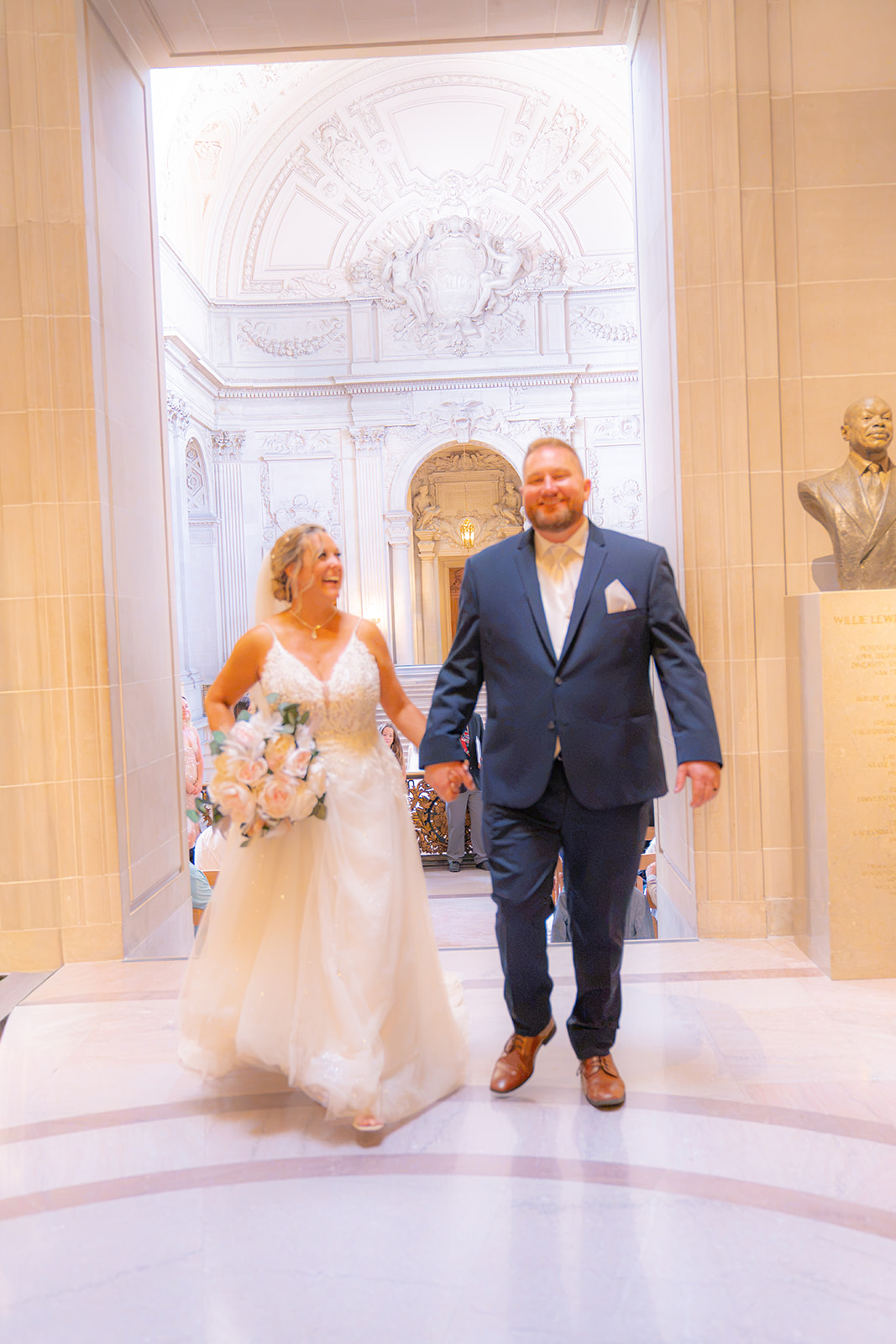 Newlywed couple together after their wedding ceremony at San Francisco City Hall