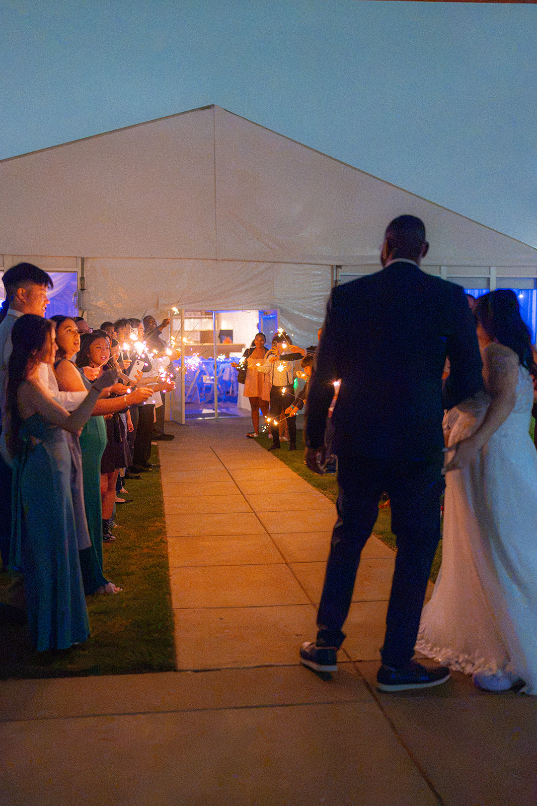 Bride and groom together before their wedding sparkler exit at Fairview Metropolitan in Oakland, California.